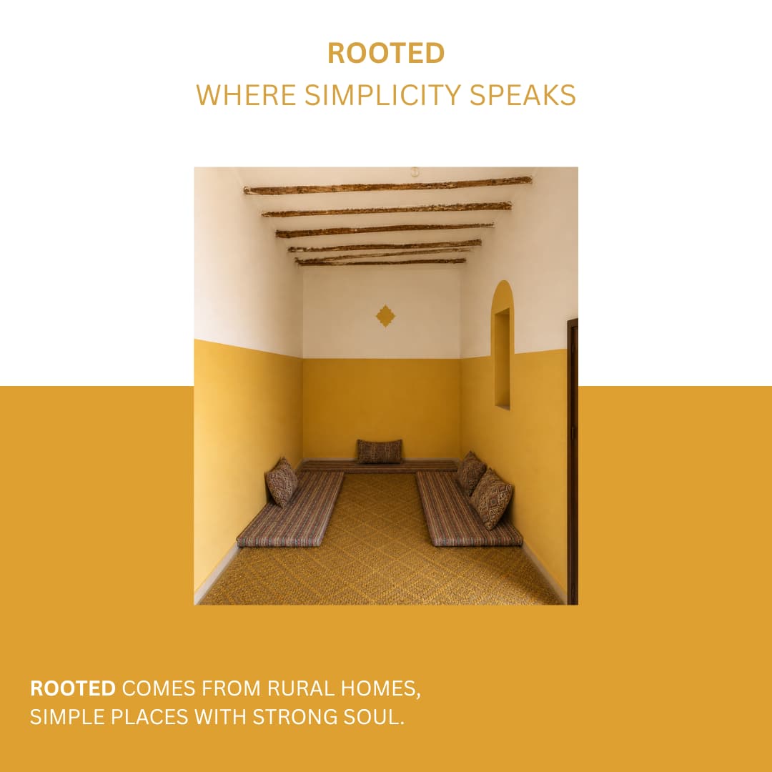 A ROOTED campaign image reading "Where Simplicity Speaks" over a photo of a mustard-yellow rural room with a wooden beam ceiling and floor seating.
